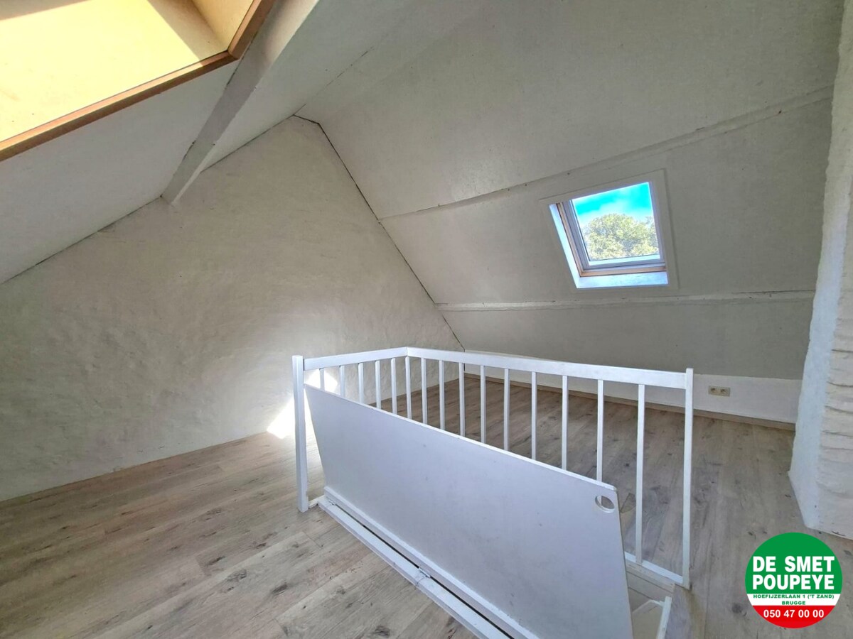 Rijwoning met tuin met uitweg 