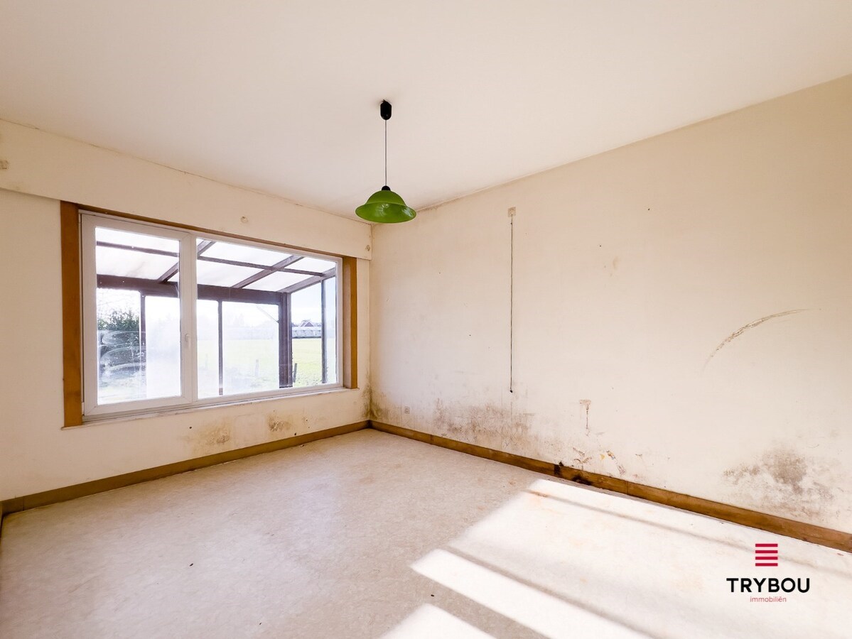 Te renoveren woning met bijgebouw op ruime perceel van 1273m² 