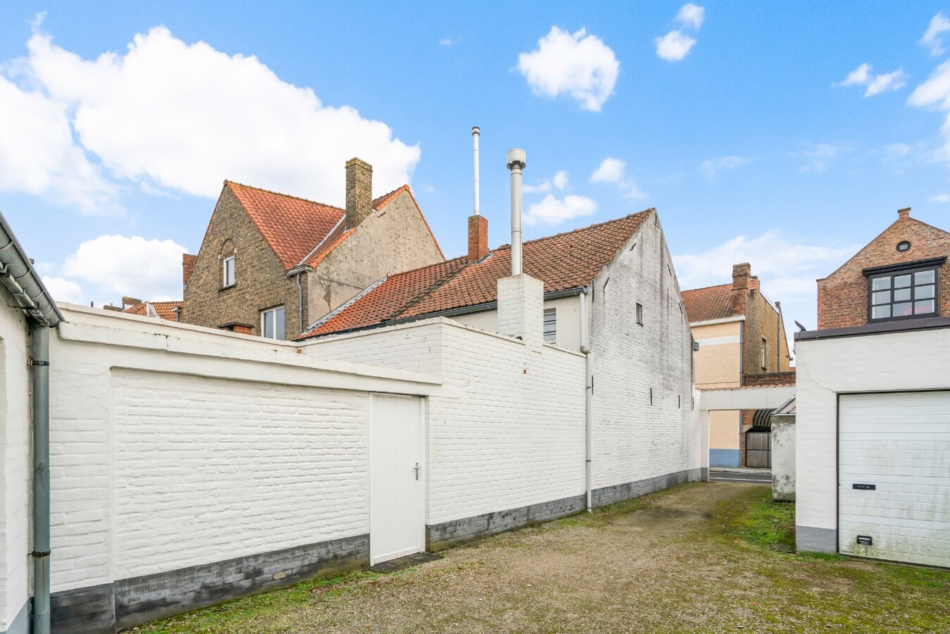 Halfopen bebouwing met terras in Christus - Koning (Stubbekwartier) 