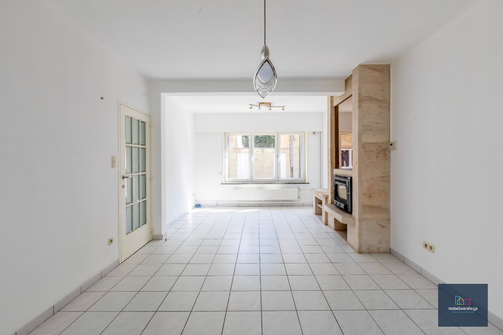 Centraal gelegen halfopen bebouwing met stadskoer 