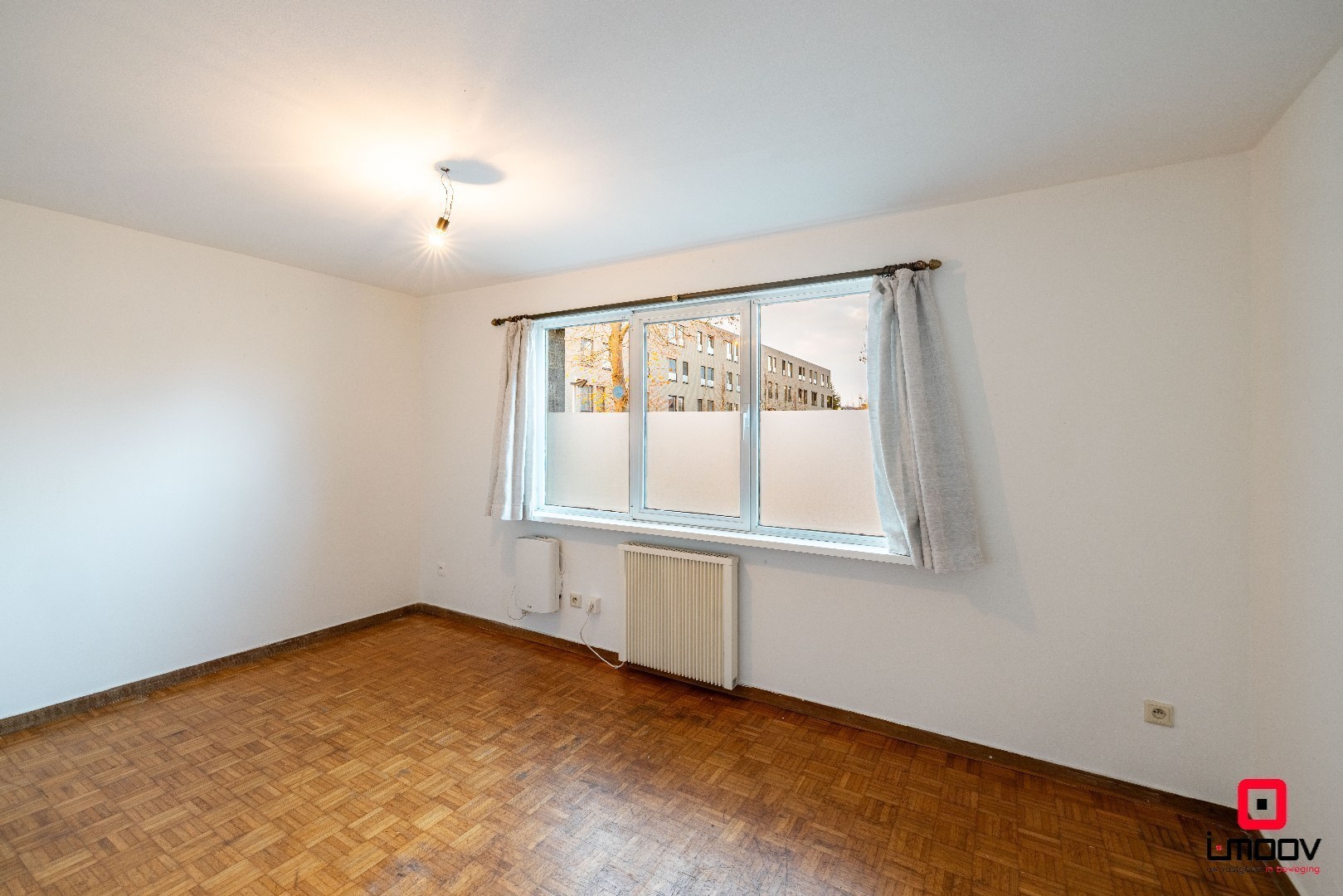 Eénslaapkamerappartement met optie voor één of twee afgesloten garageboxen op TOPLOCATIE aan Gent-Sint-Pieters 