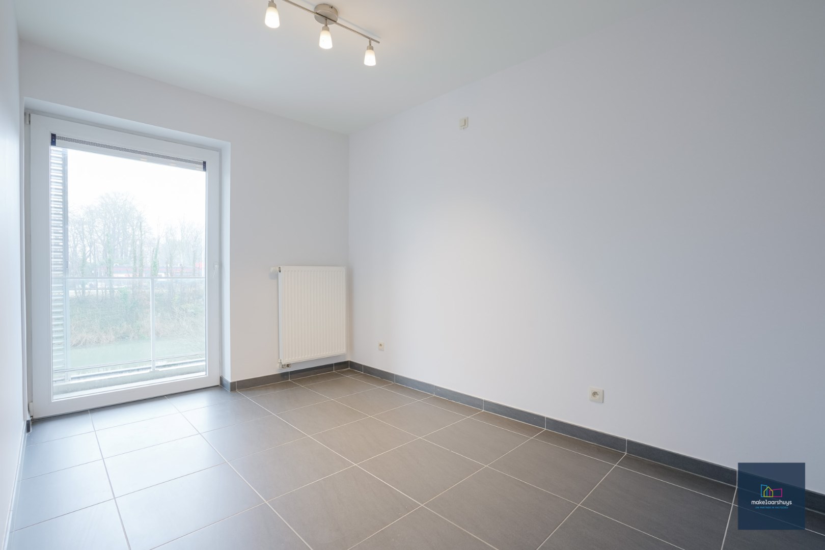 2 slp. app met terras te Mariakerke 