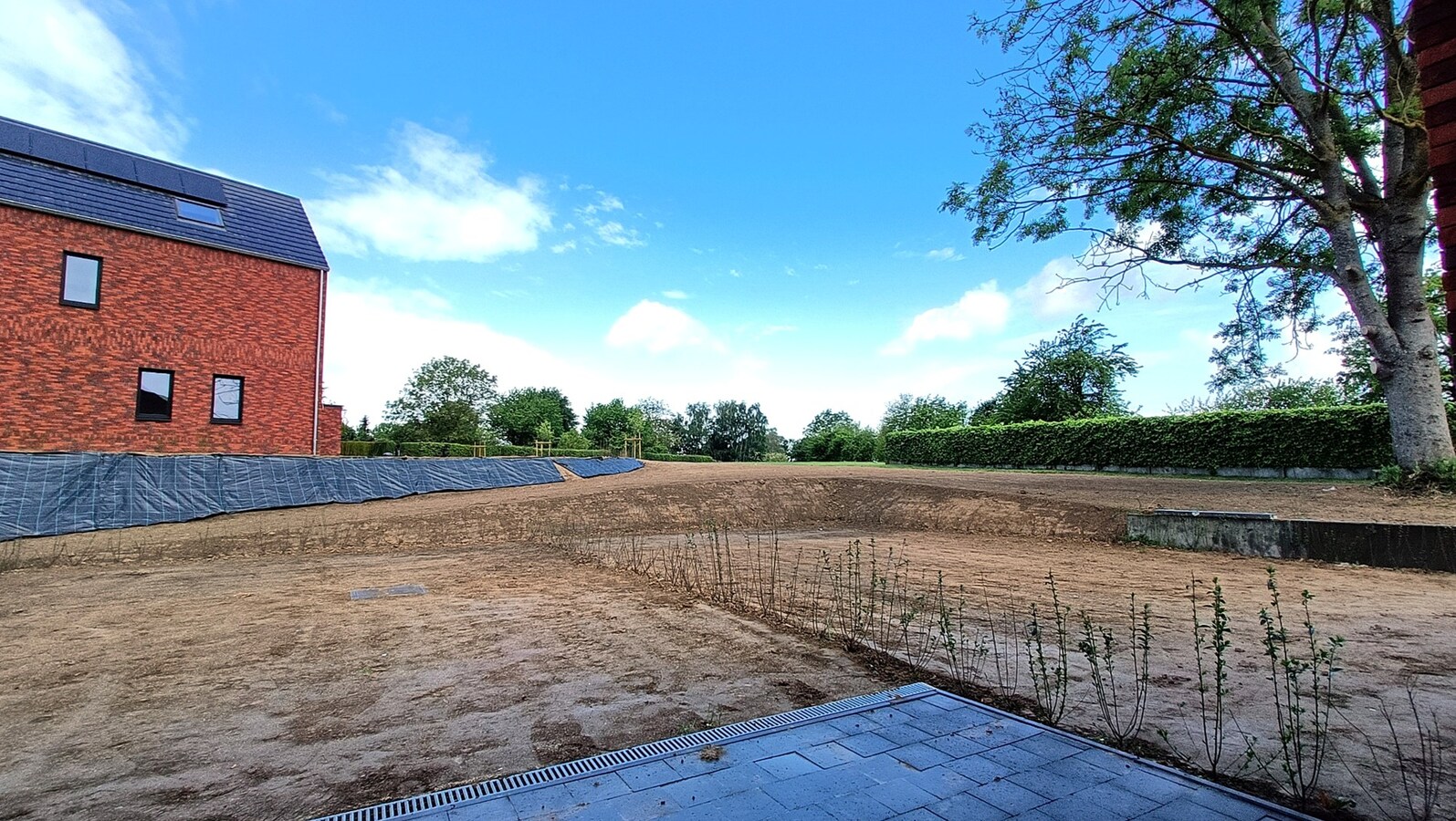 Nieuwbouwappartement met tuin en terras 