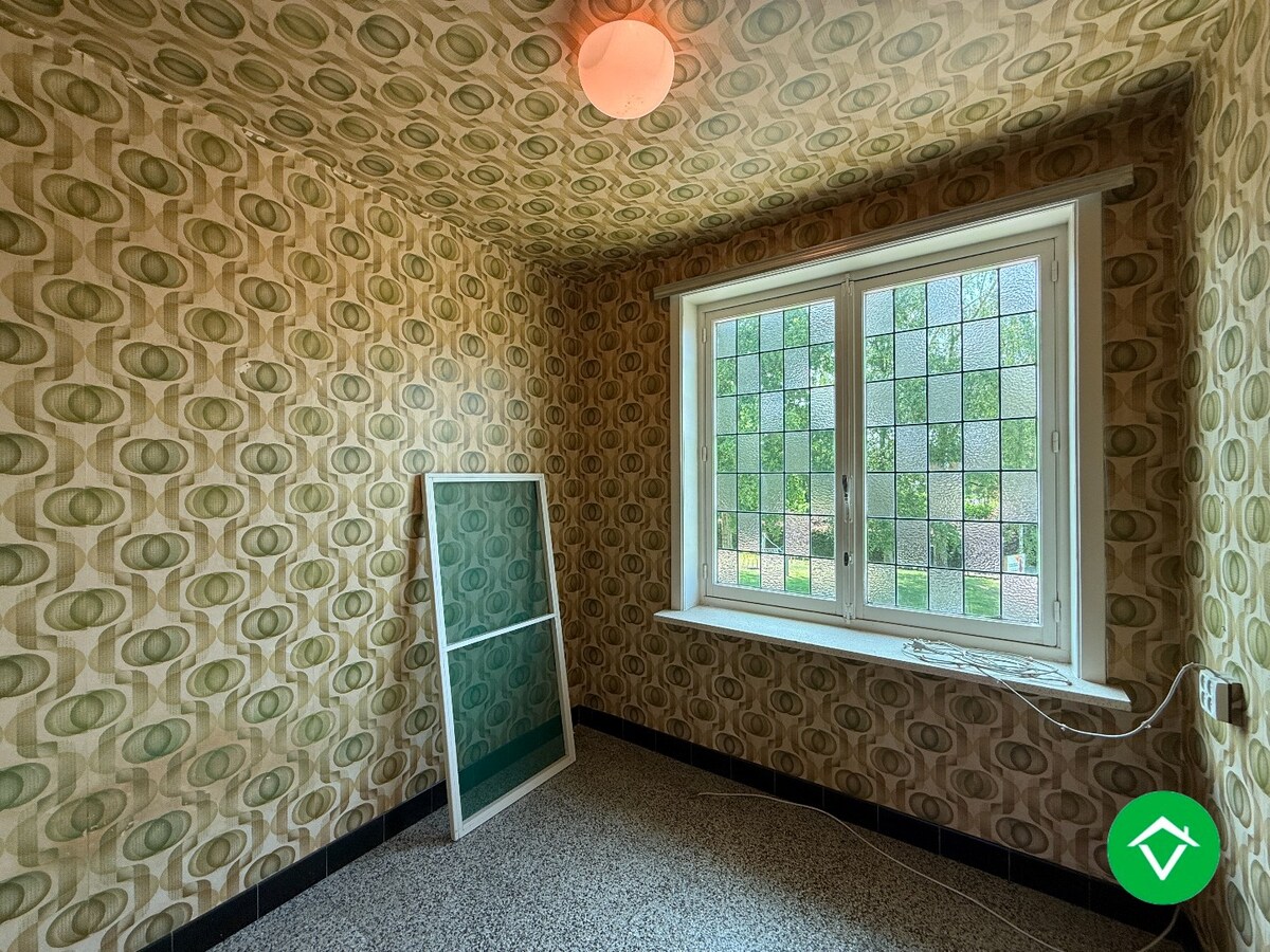 Stevige woning met 3 slaapkamers, tuin en garage in een rustige wijk te Rumbeke 