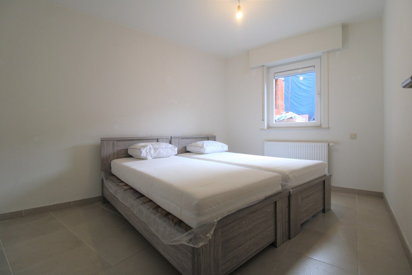 Appartement met twee slaapkamers en autostaanplaats in centrum Roeselare 