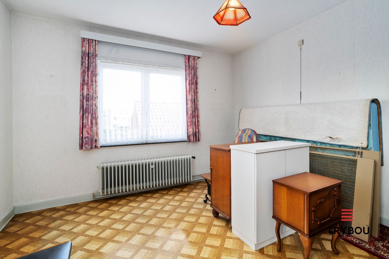 Degelijke woning op ruim perceel van 700m² 