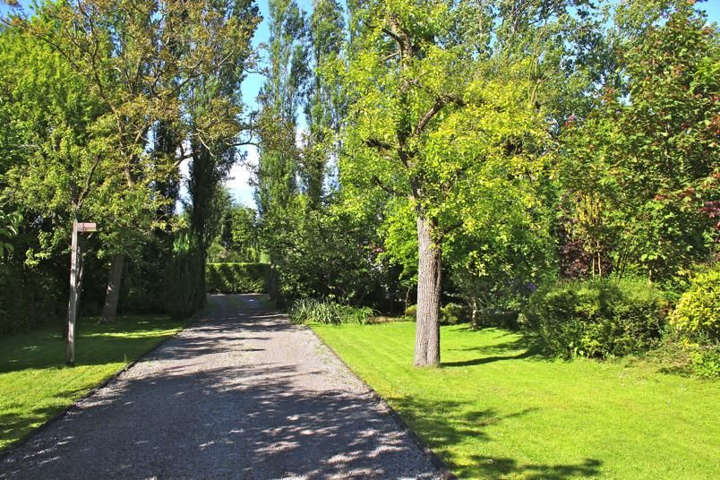 Villa + grote tuin aan de Leie 