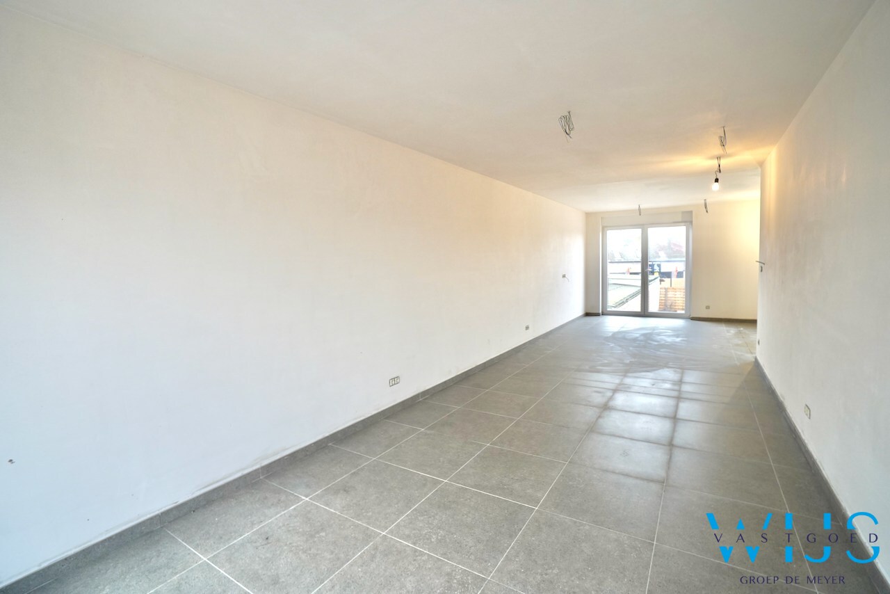 Drieslaapkamer appartement met garage in hartje Ertvelde ! 