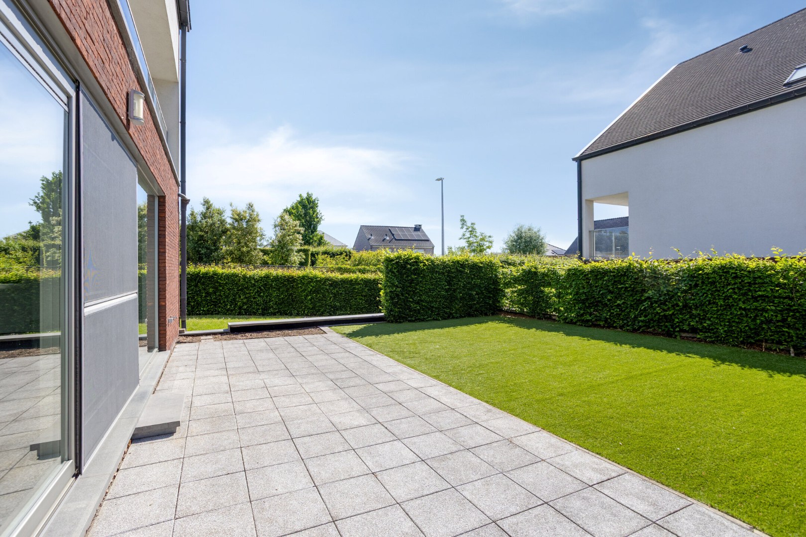 Instapklaar gelijkvloers appartement met groot terras, tuin en garagebox in Kumtich - EPC 104 KWH/m² 