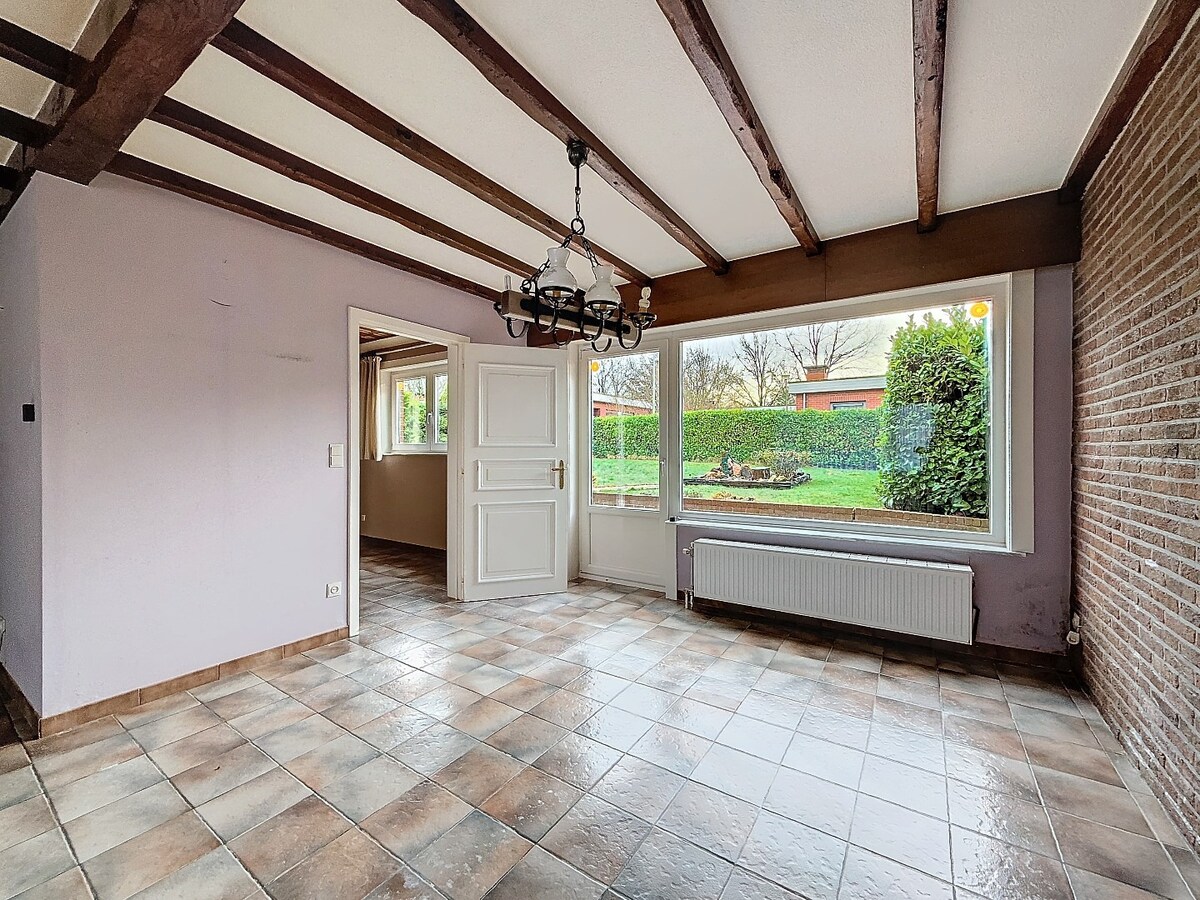 Op te frissen HOB met garage en tuin te Bijloke 