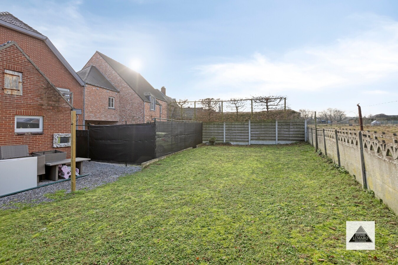 Gelijkvloers appartement met tuintje en parking 