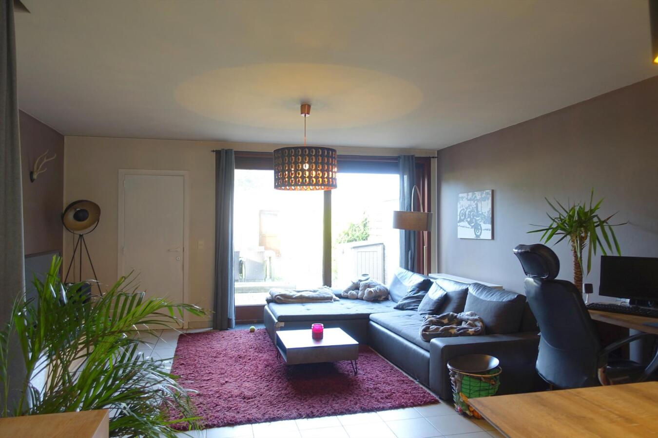 Gezellige rijwoning met tuin en een dubbele garage 