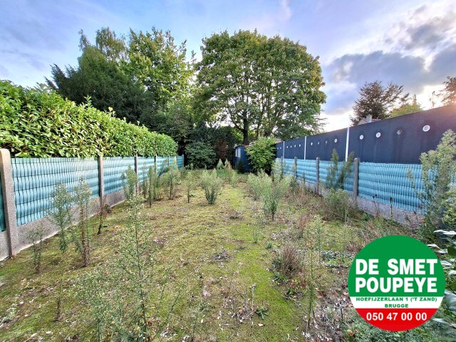 Ruime rijwoning met garage en tuin 