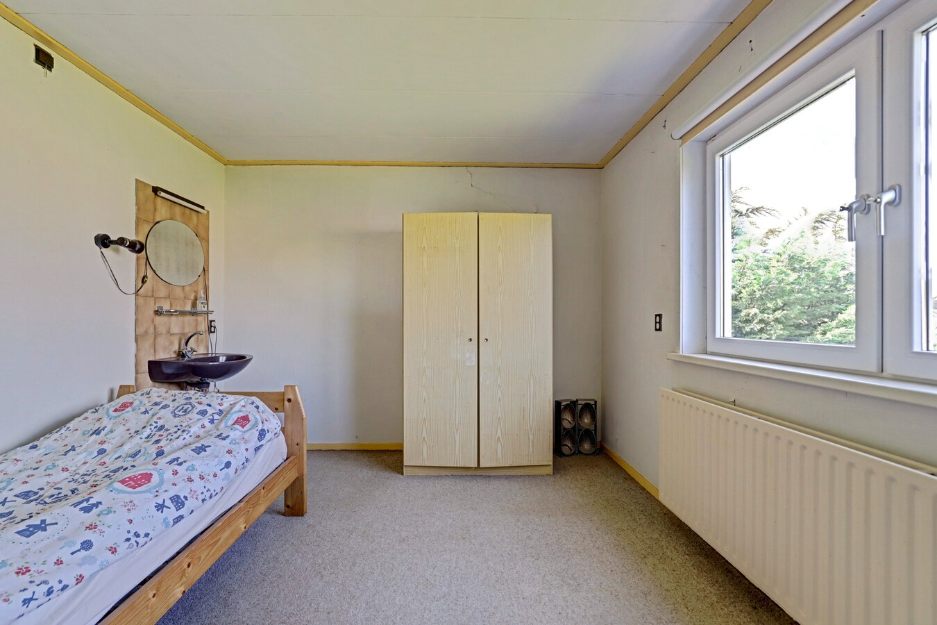 Vrijstaande woning met vijf slaapkamers, garage en royale tuin 
