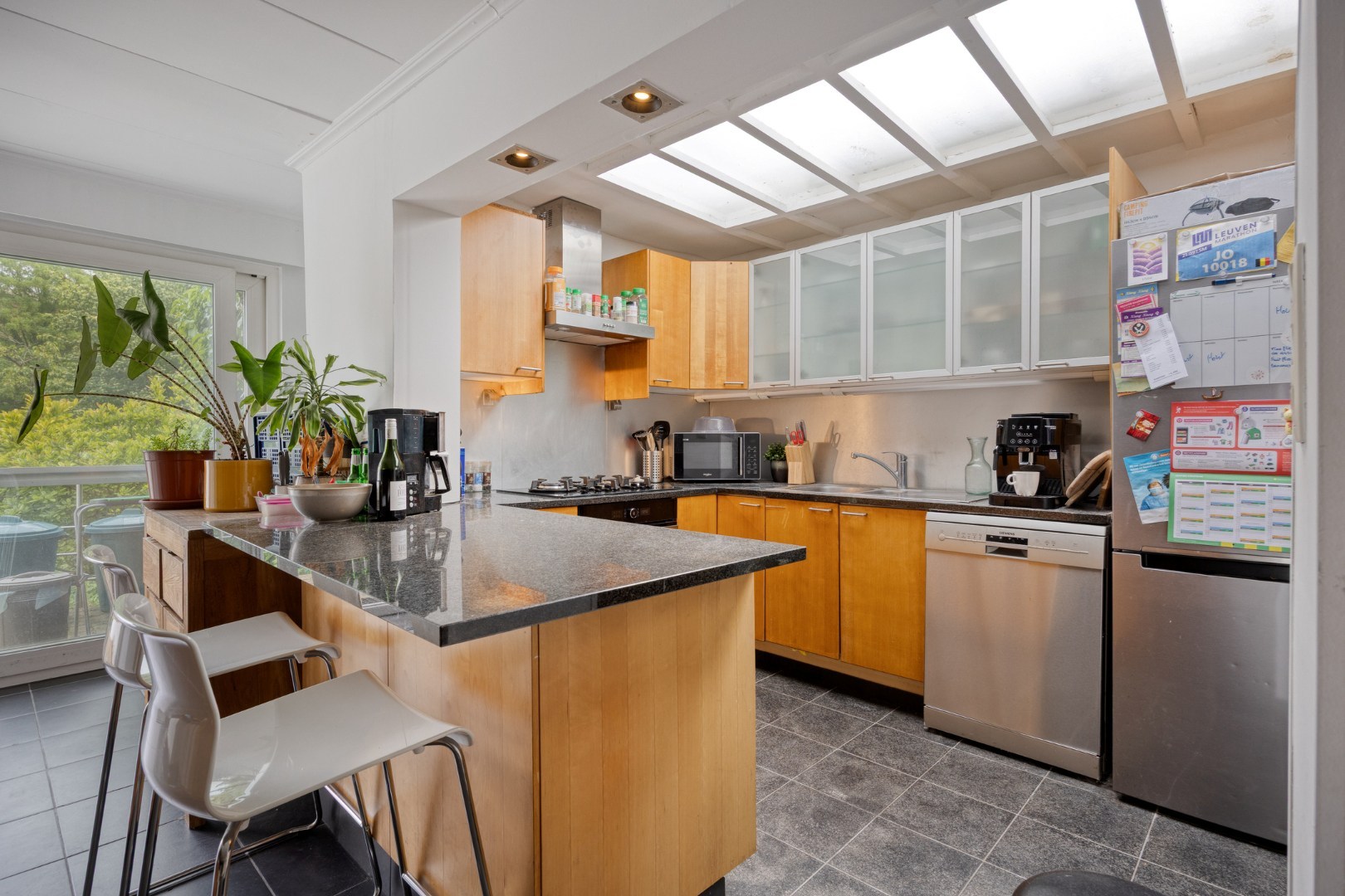 Ruime stadswoning met achteruitgang via Janseniusstraat met 4 slaapkamers, garage en tuin te Leuven- EPC 239kwh/m2 