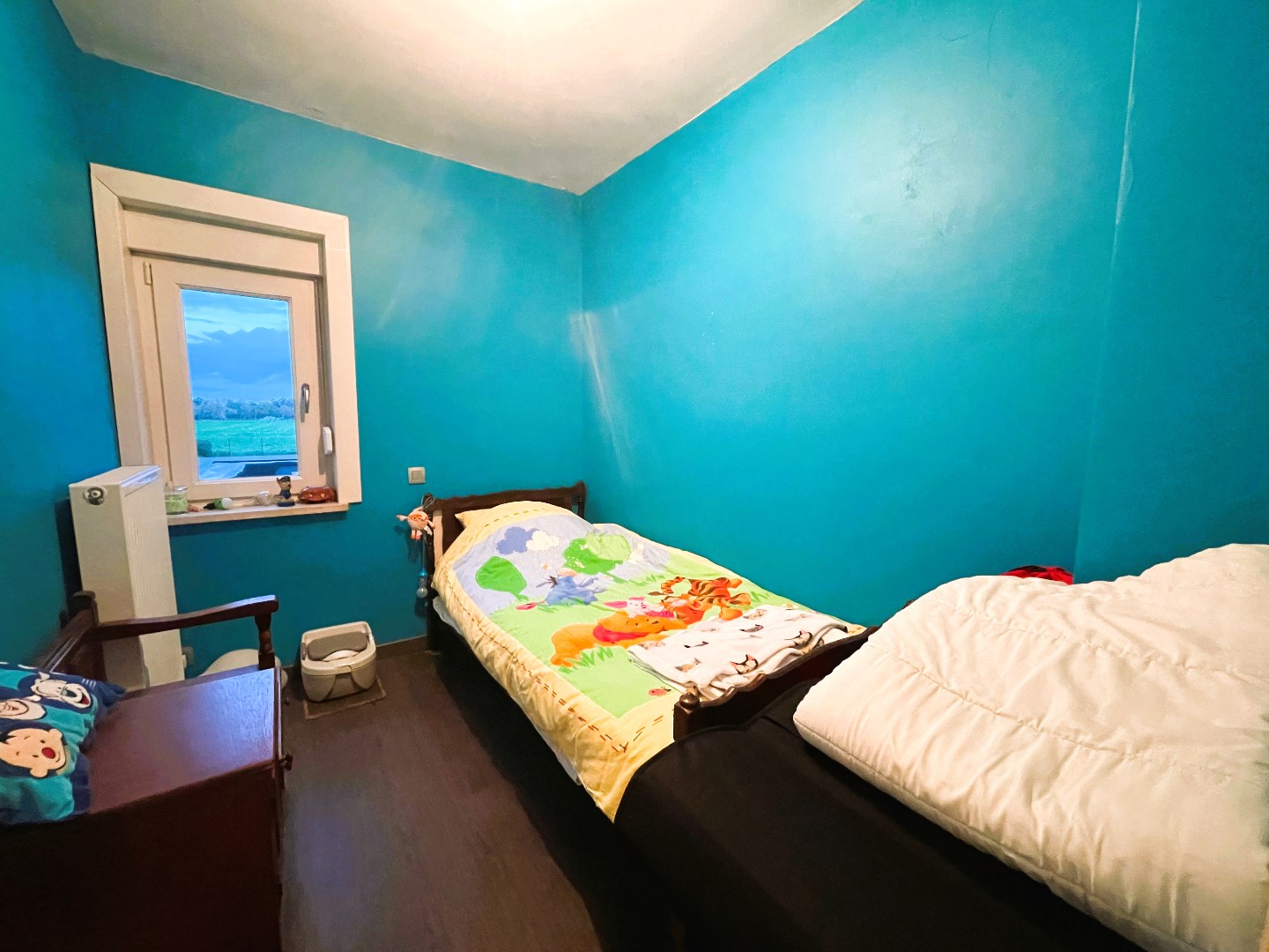 Gezellige rijwoning met 3 slaapkamers en uitweg 