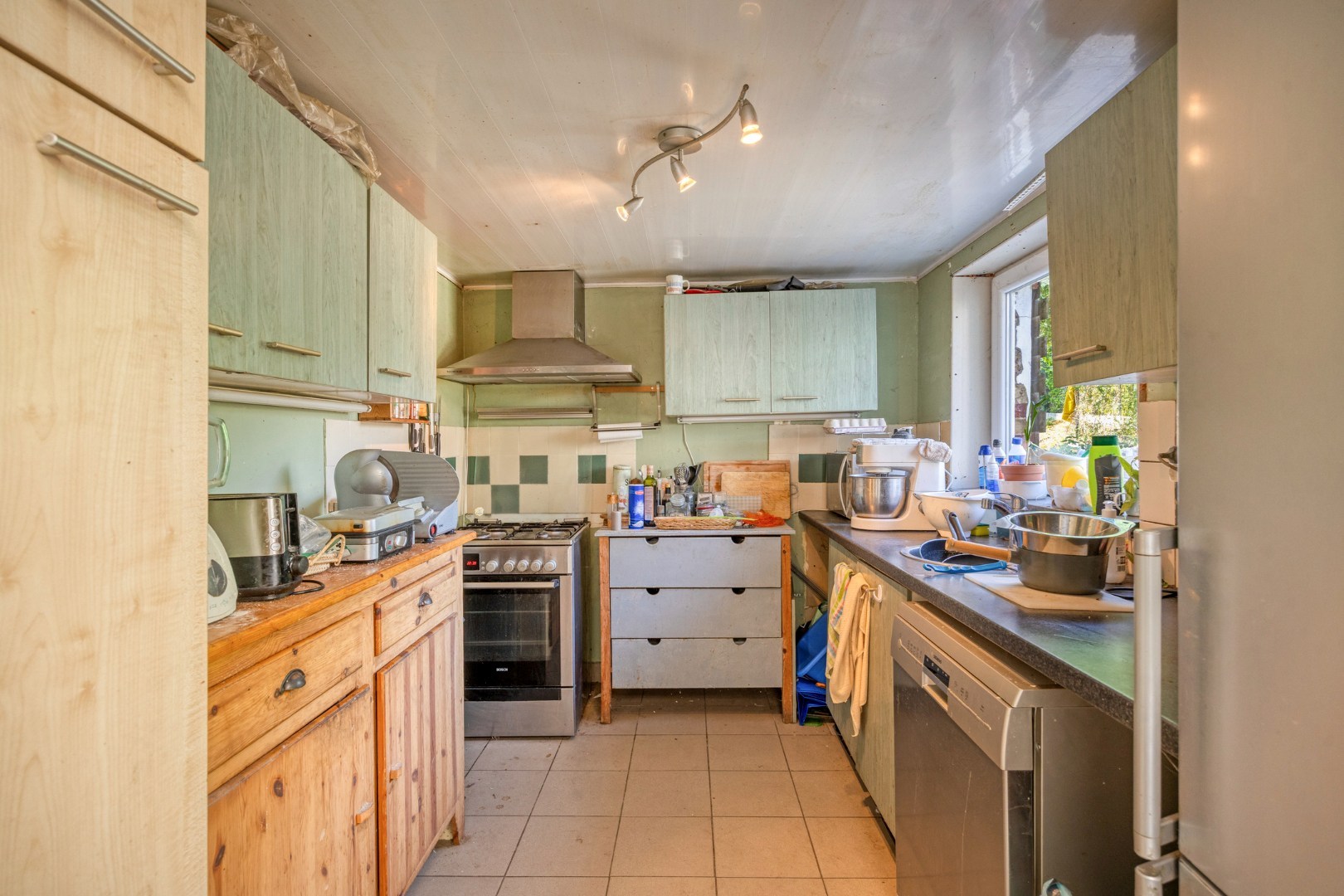 Halfopen bebouwing met 5 ruime slaapkamers, 2 badkamers, garage en tuin in Holsbeek – bewoonbare oppervlakte 214m² 