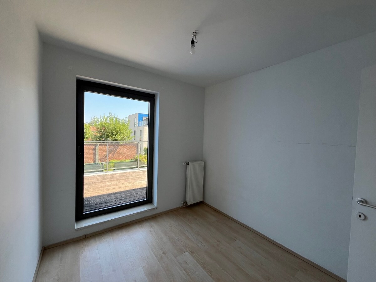 Centrumwoning met tuin, terras én ondergrondse parkeerplaats. 