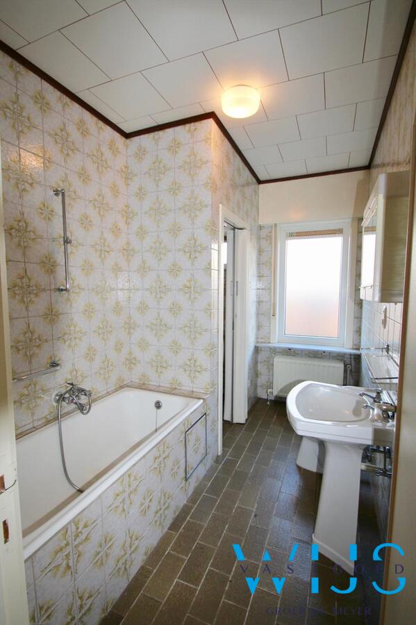 Charmante open bebouwing gelegen in gezellige wijk te Evergem! 