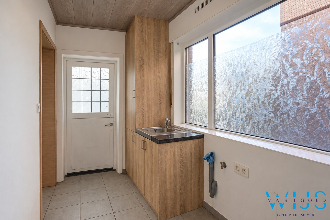 Gerenoveerde woning met diepe tuin en garage in Zelzate 