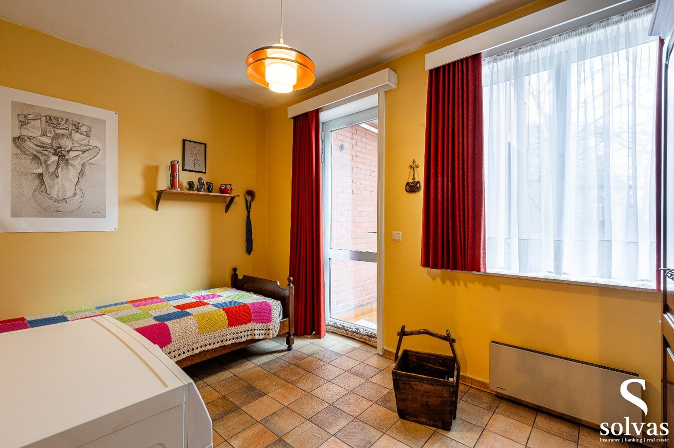 Gebouw met 4 appartementen en 2 handelspanden in centrum Maldegem 