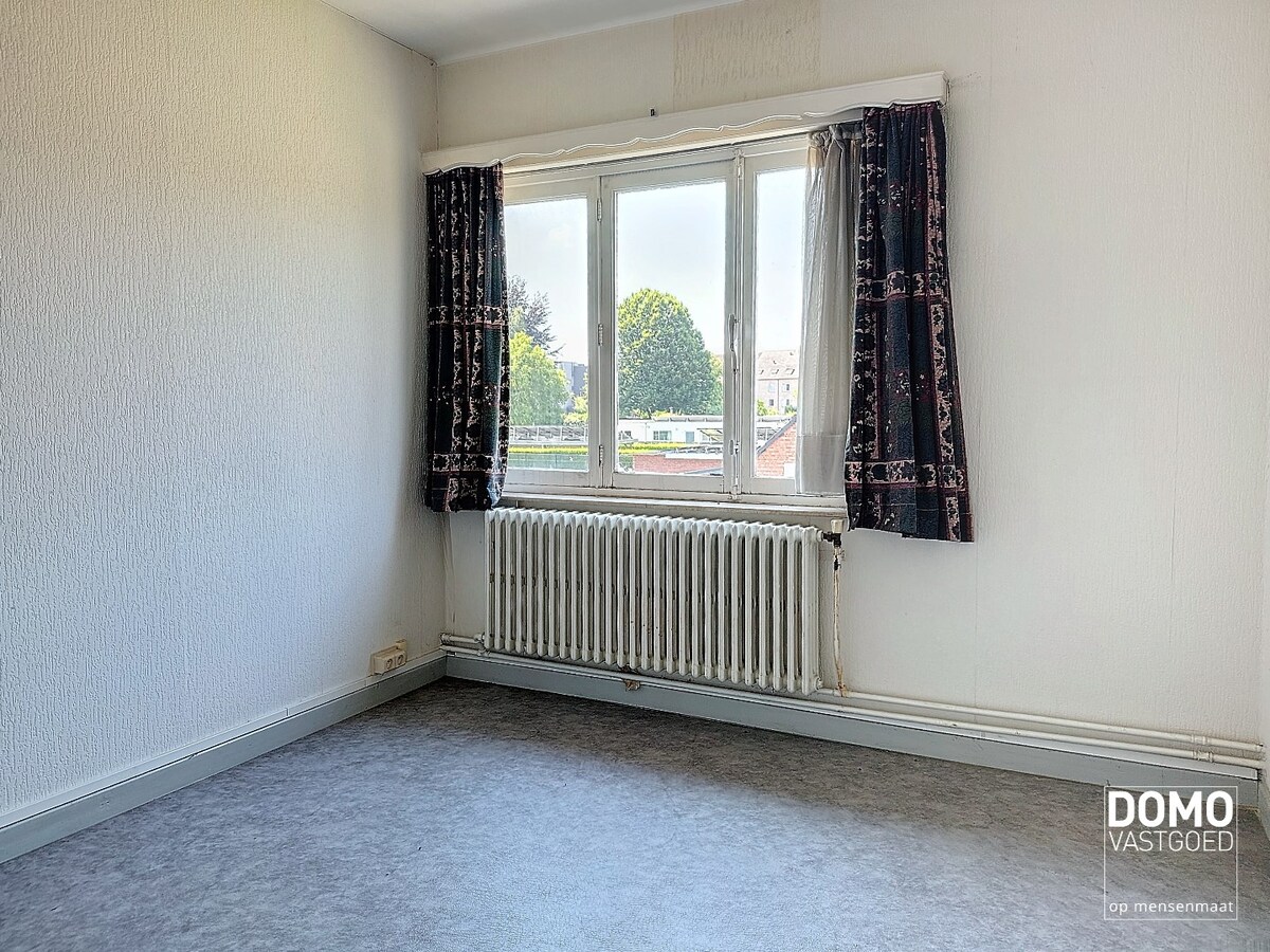 Te renoveren karaktervolle open bebouwing met tuin - mogelijkheid tot creëren extra half open bebouwing 