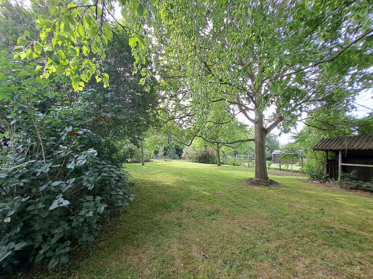 Maison style fermette alliant charme et confort bénéficiant d'un jardin exceptionnel 