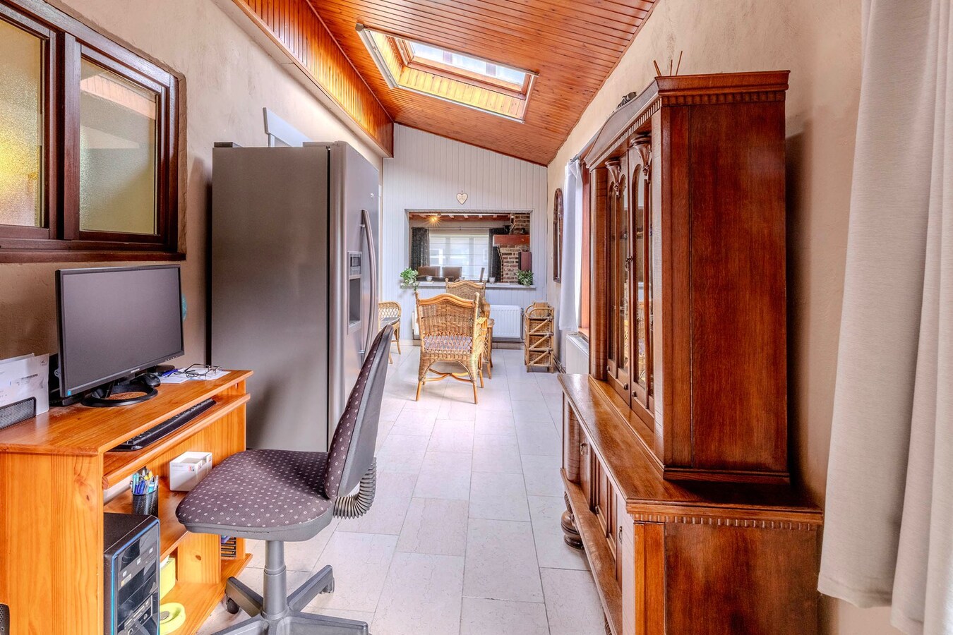 Gezinswoning met 2/3 slpks, ruime tuin en magazijn 