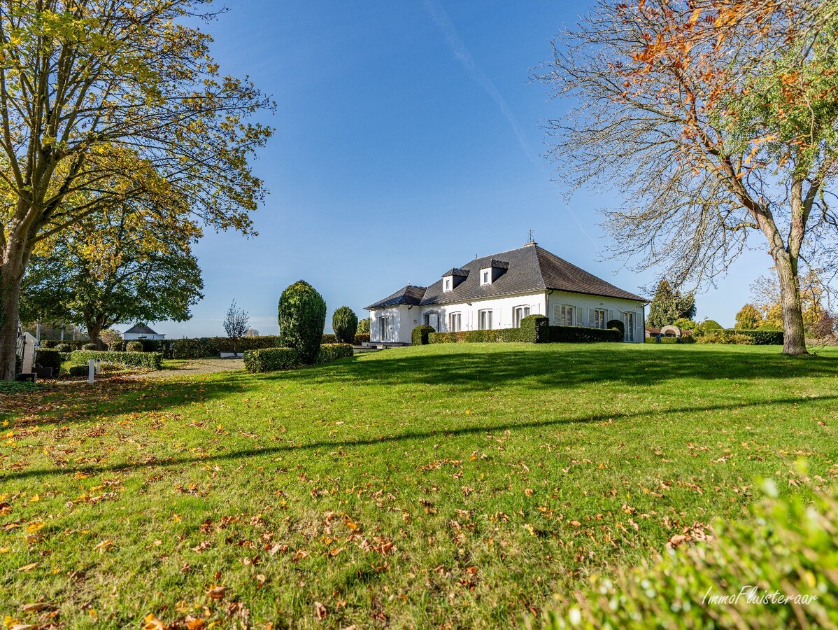 Rural villa with multifunctional outbuilding on approximately 51 acres in Bilzen 