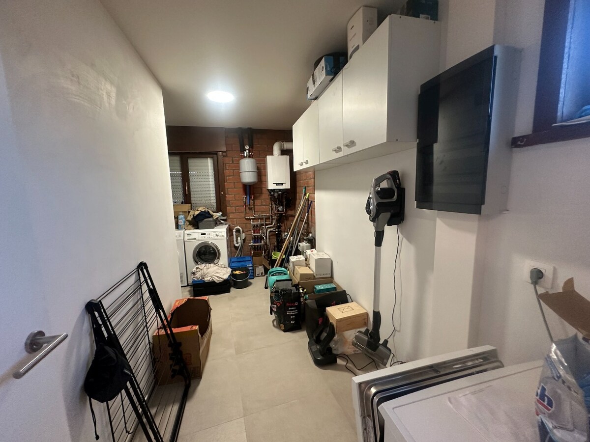 Ruime woning met zonnige tuin in centrum Merkem 