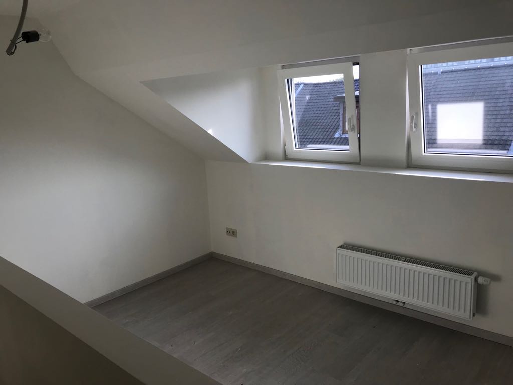 Instapklare eengezinswoning met aangelegde tuin in centrum Temse 