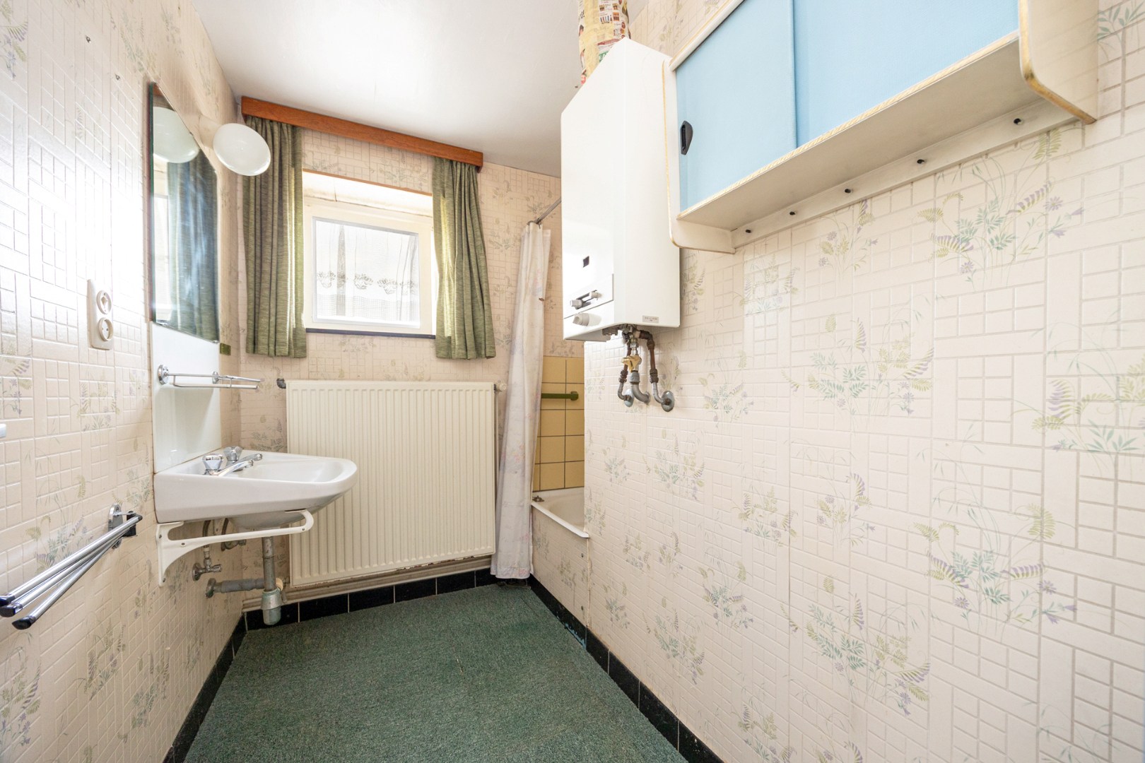 Te renoveren halfopen bebouwing 