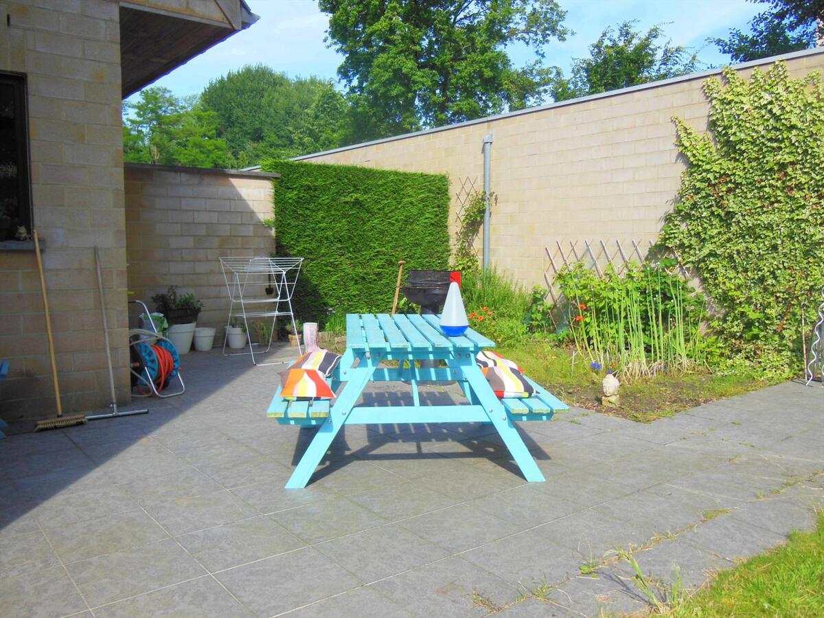 Gezellig gelijkvloersappartement met zonnige tuin en garage 