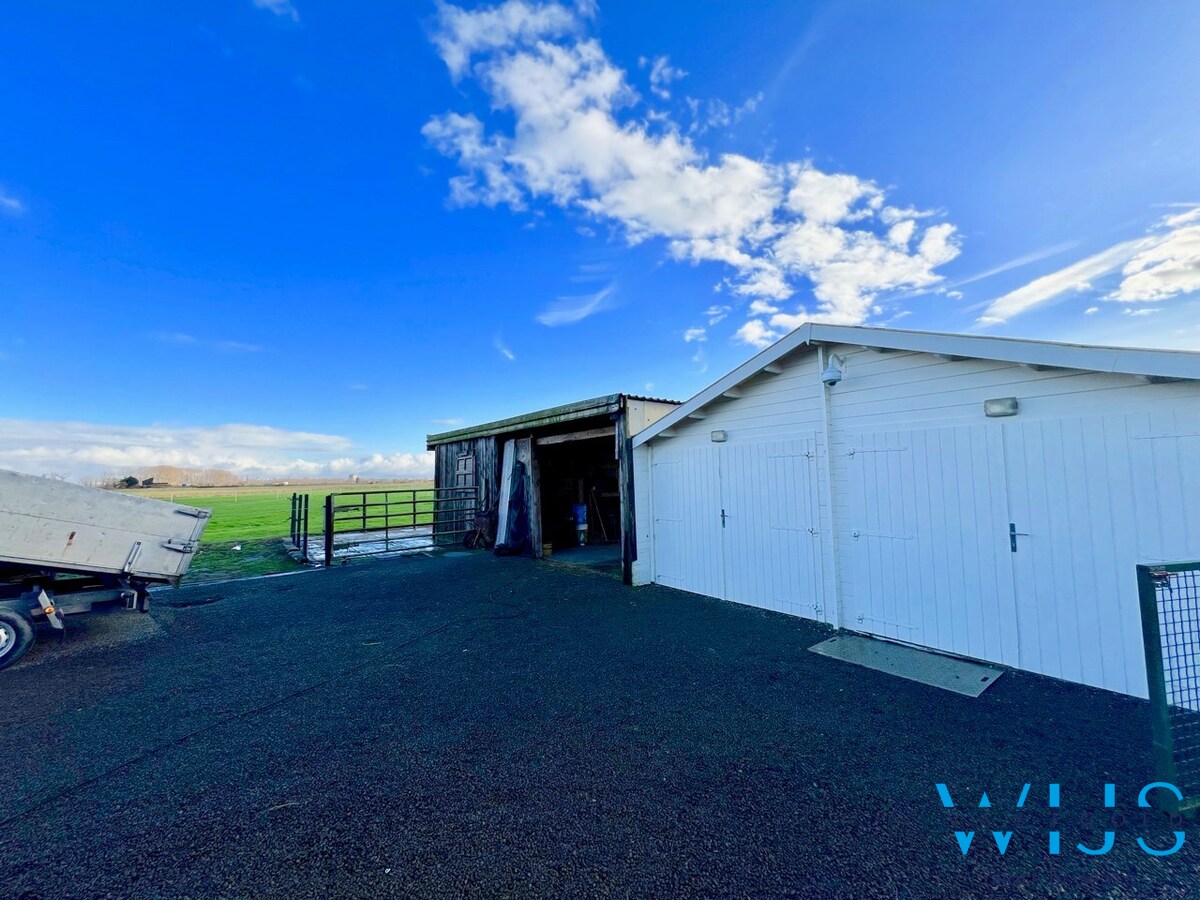 Instapklaar woonhuis op 17.400 m² grond te ASSENEDE ! 