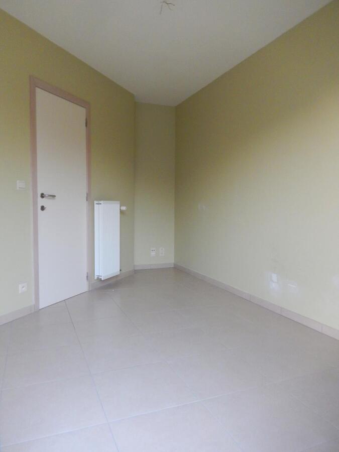 Gezellig en lichtrijk 2 slaapkamerappartement met garage 