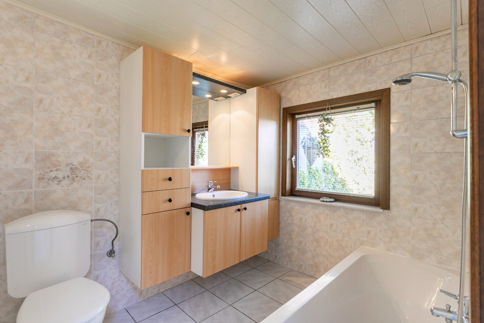 Verzorgde woning met 3 slaapkamers en leuke tuin te Halle 