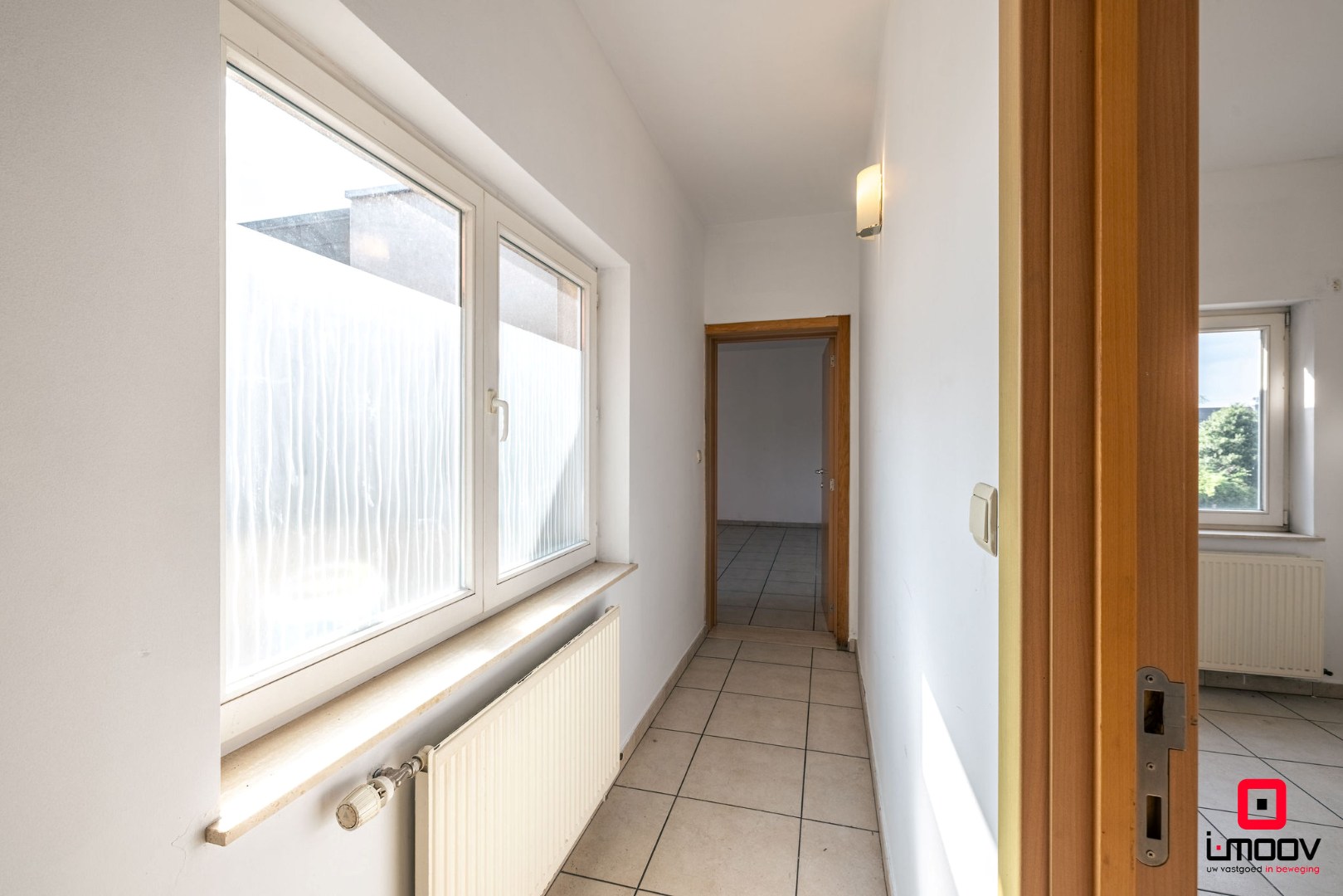 Lichtrijk en instapklaar wonen op de eerste verdieping nabij Gent 