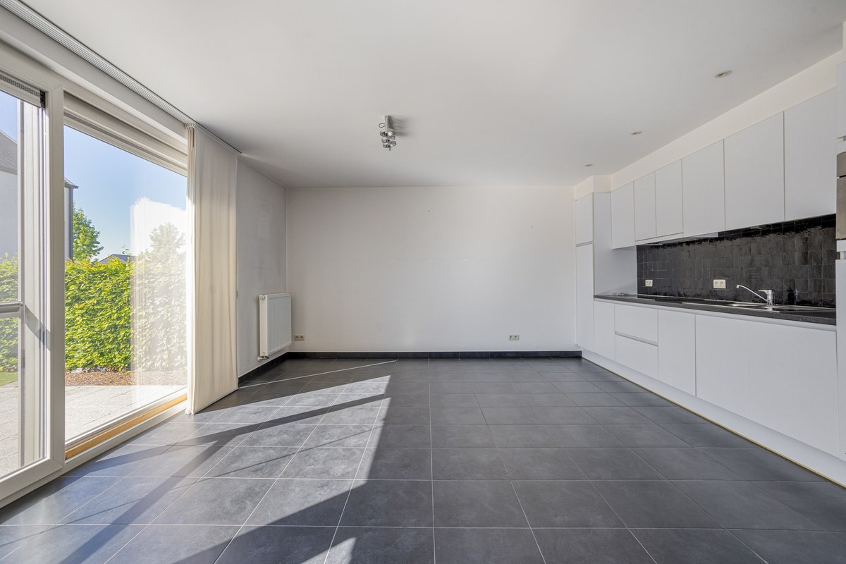 Instapklaar gelijkvloers appartement met groot terras, tuin en garagebox in Kumtich - EPC 104 KWH/m² 