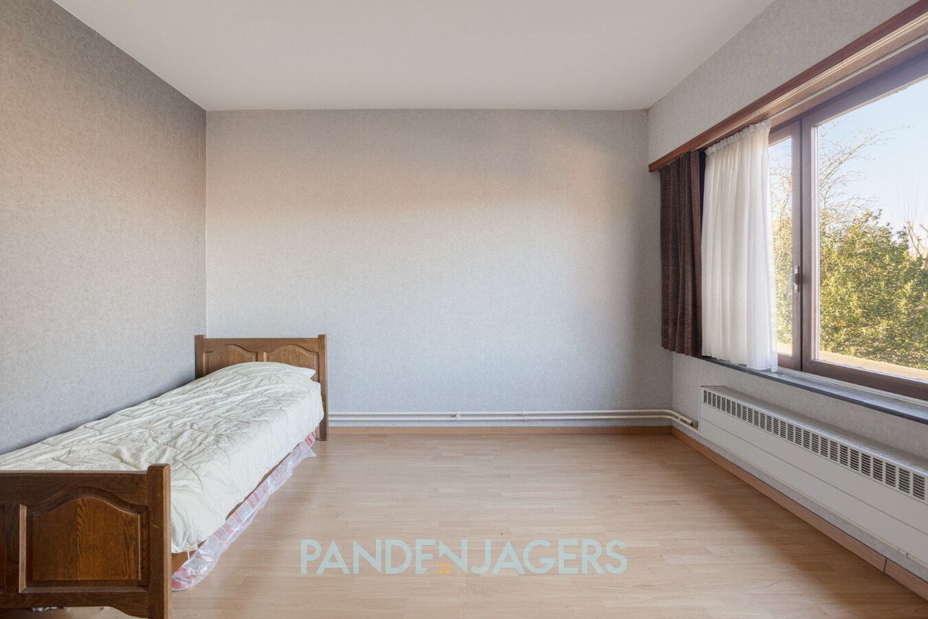 Ruime woning met 3 slaapkamers, garage en zuidgerichte tuin te Duffel-Oost 