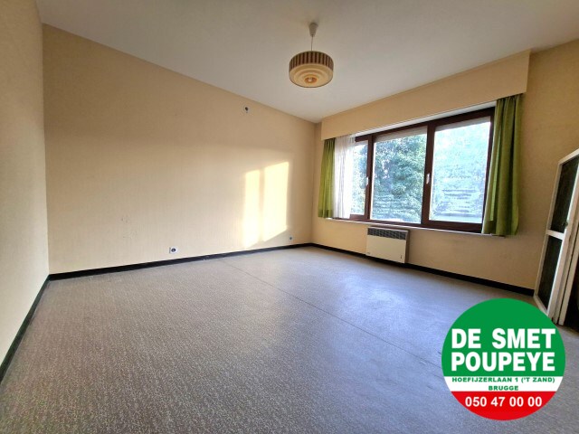 Ruime rijwoning met garage en tuin 