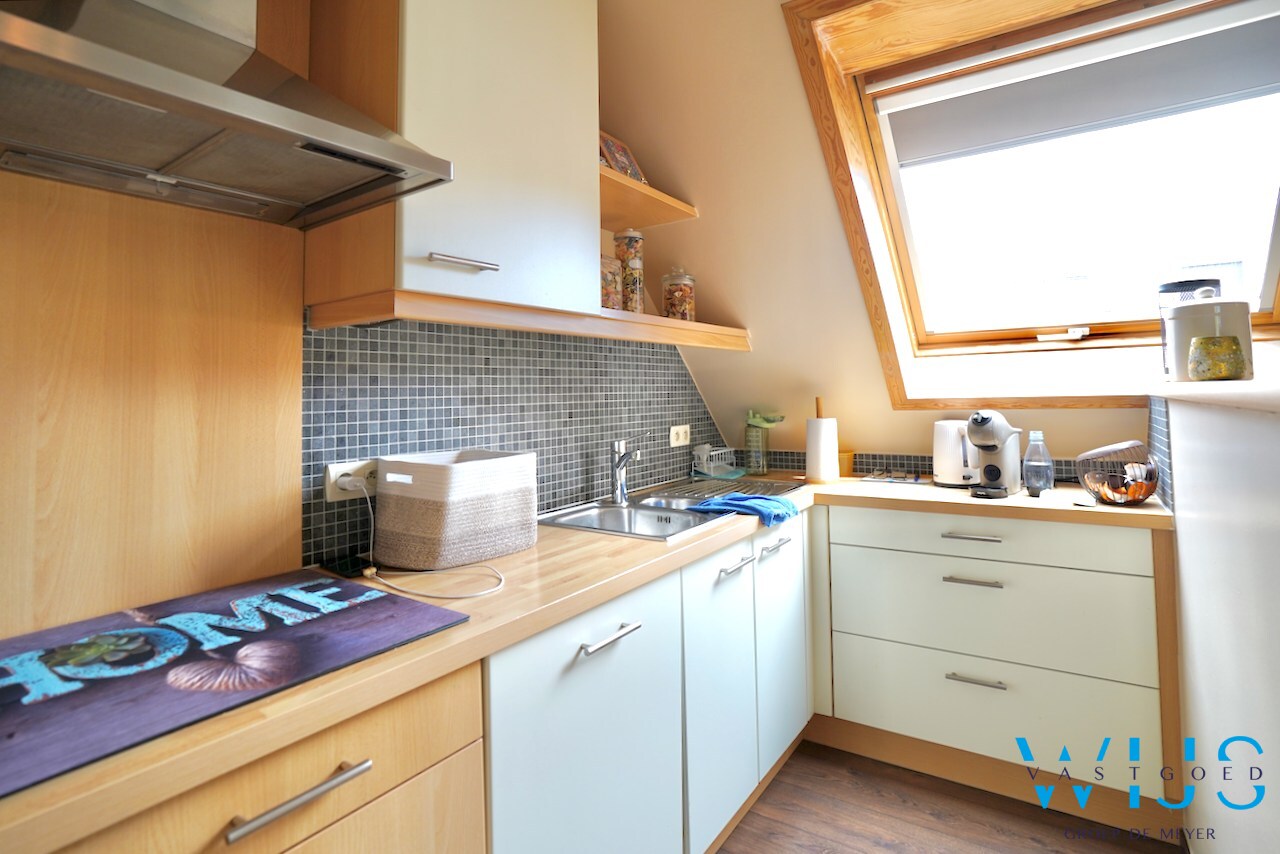 Charmant instapklaar tweeslaapkamer appartement in centrum Ertvelde! 