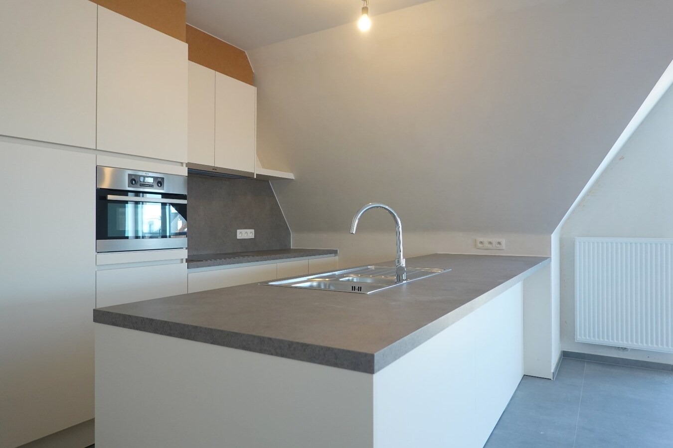 Nieuwbouwappartement in centrum met dubbel garage 