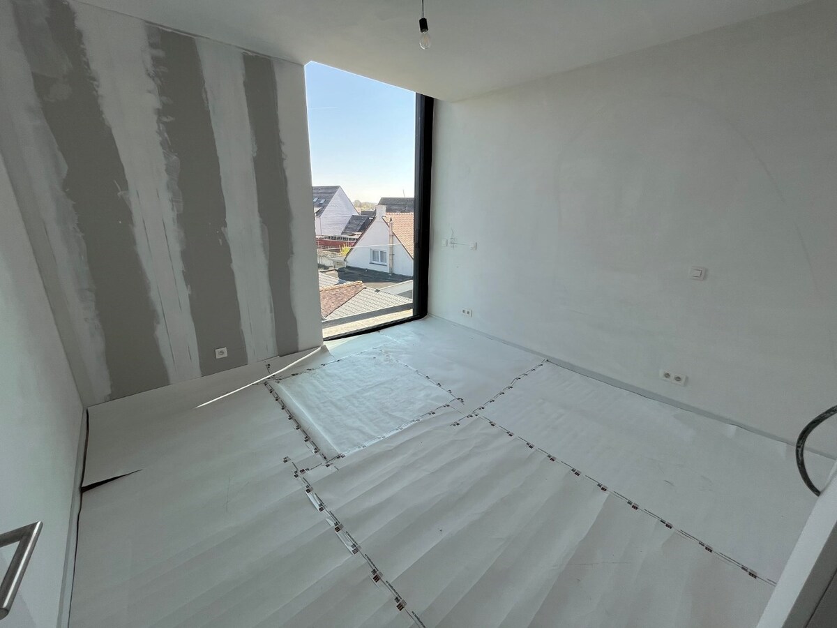 Luxe penthouse in hartje Zingem 