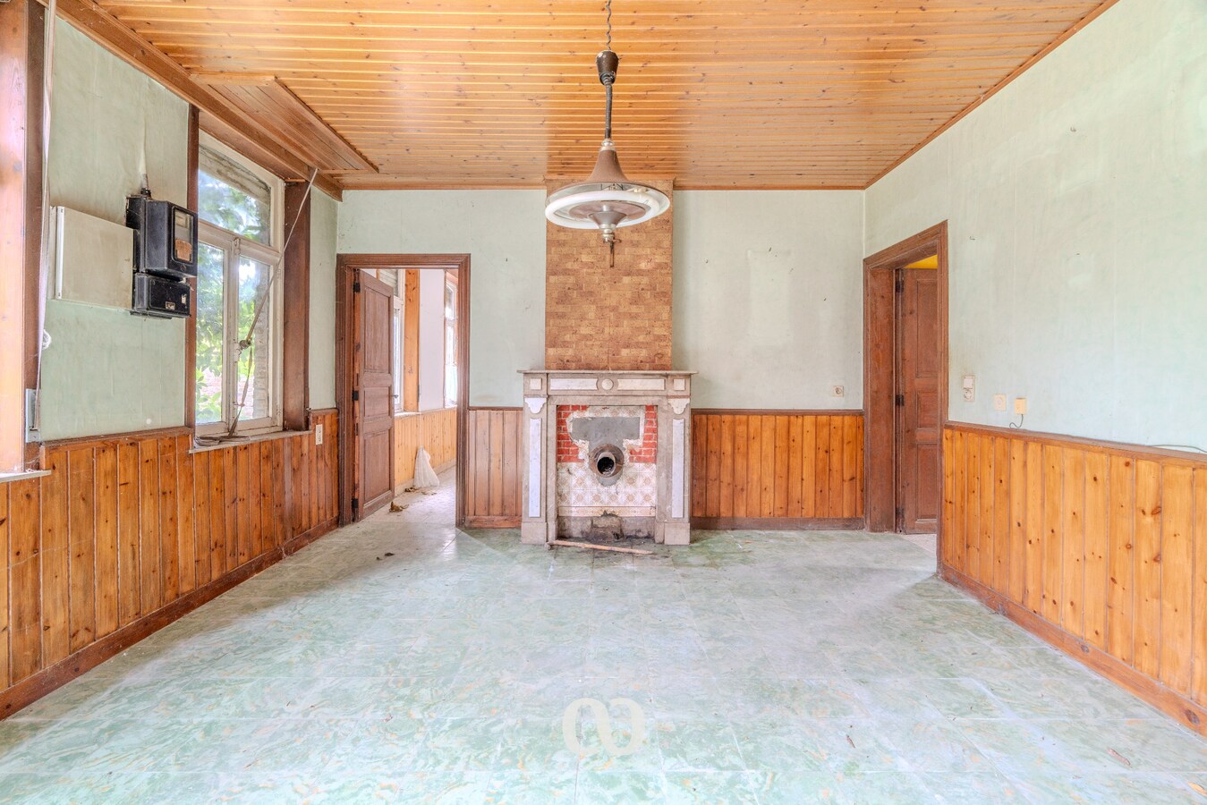 Pastorijwoning met tal van bijgebouwen 