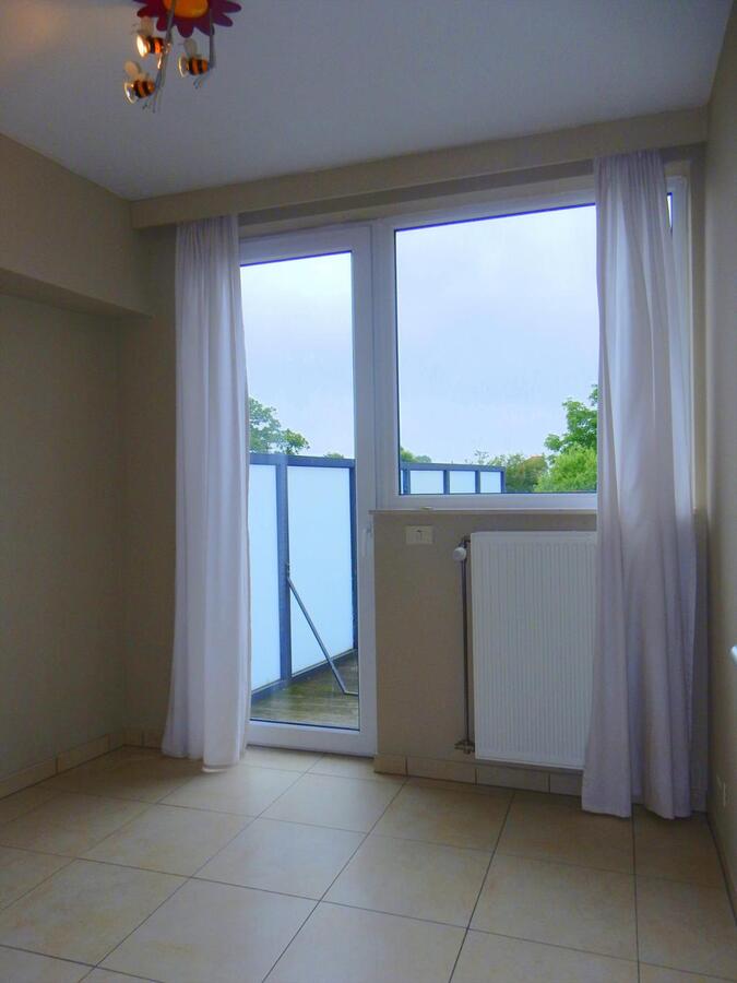 Lichtrijk appartement met groot terras en garagebox 