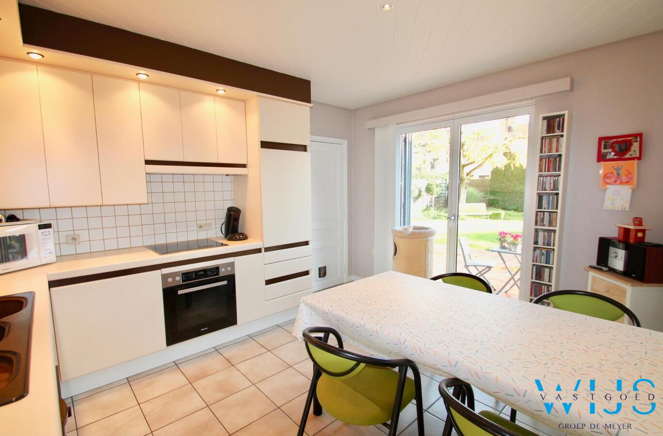 Volwaardig woonhuis met zongerichte tuin op absolute toplocatie in Ertvelde! 