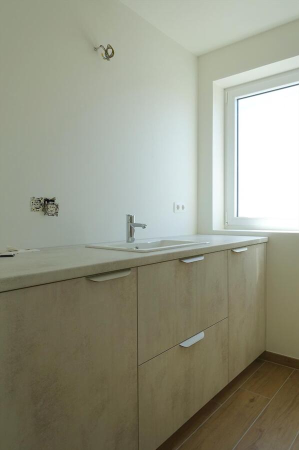 Half-open nieuwbouwwoning met zonnige tuin 