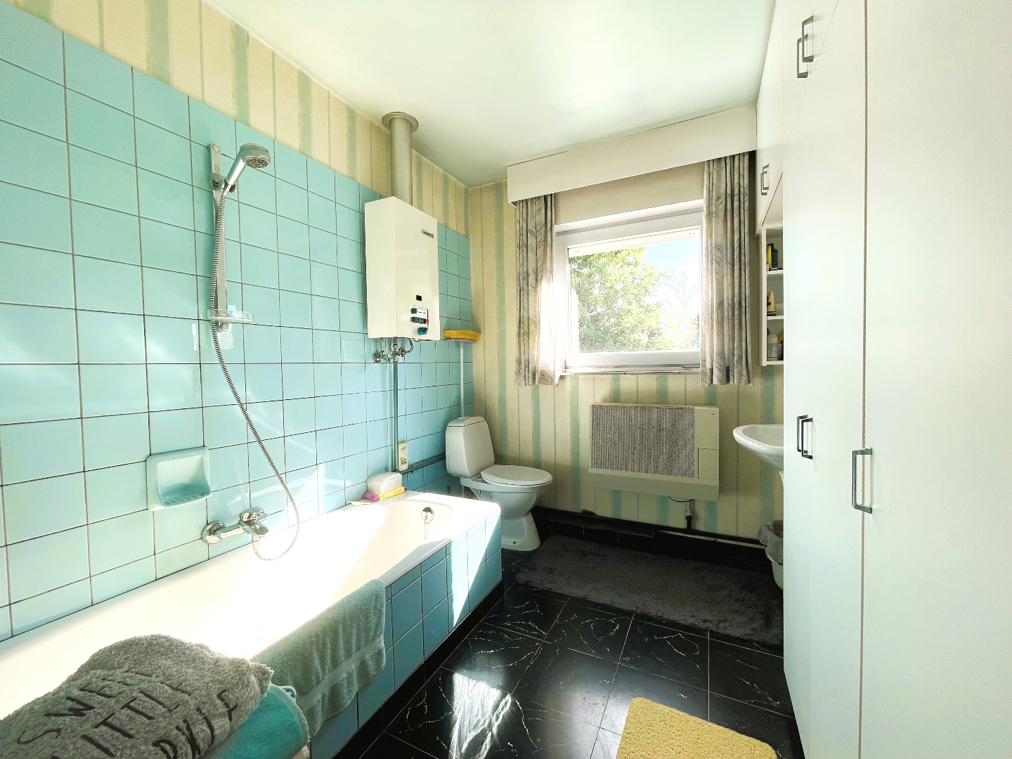 Halfopen bebouwing met 4 slaapkamers en leuke tuin 