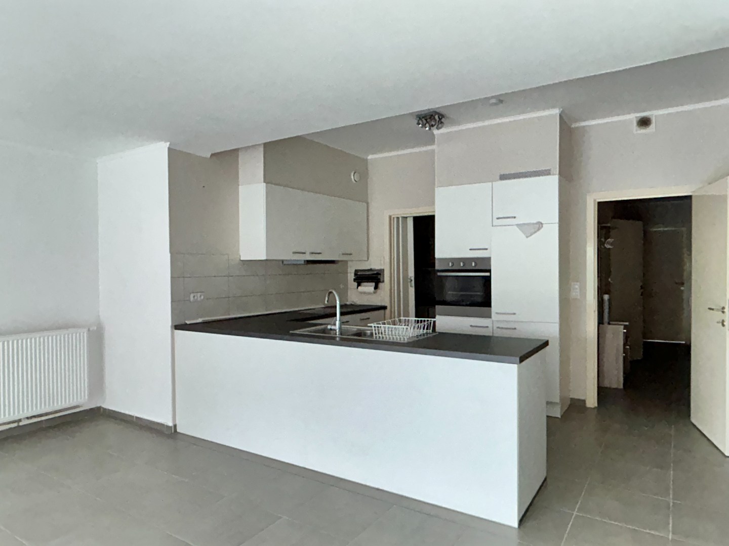 Gelijkvloers appartement van 106m² met garage en autostaanplaats 