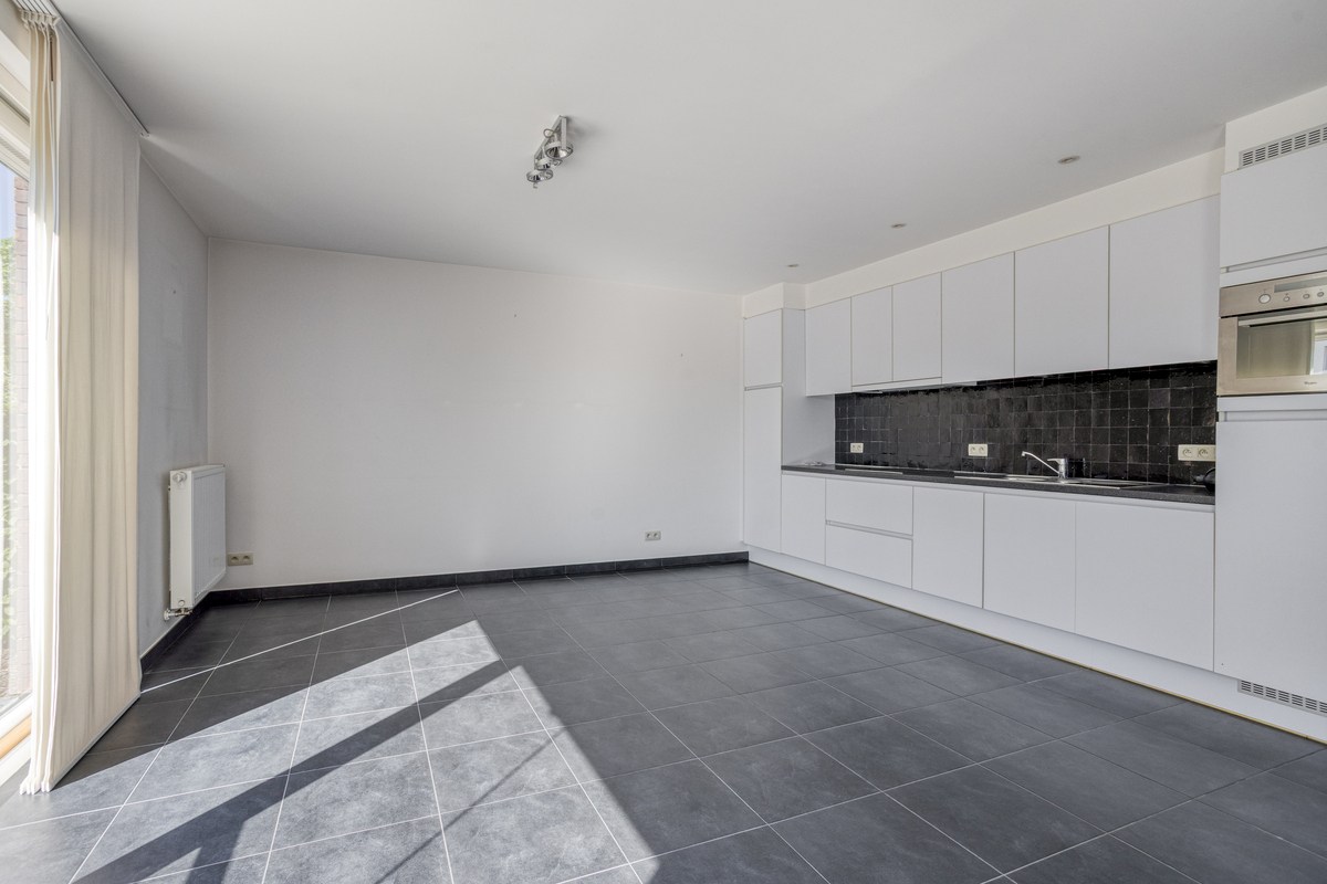 Instapklaar gelijkvloers appartement met groot terras, tuin en garagebox in Kumtich - EPC 104 KWH/m² 